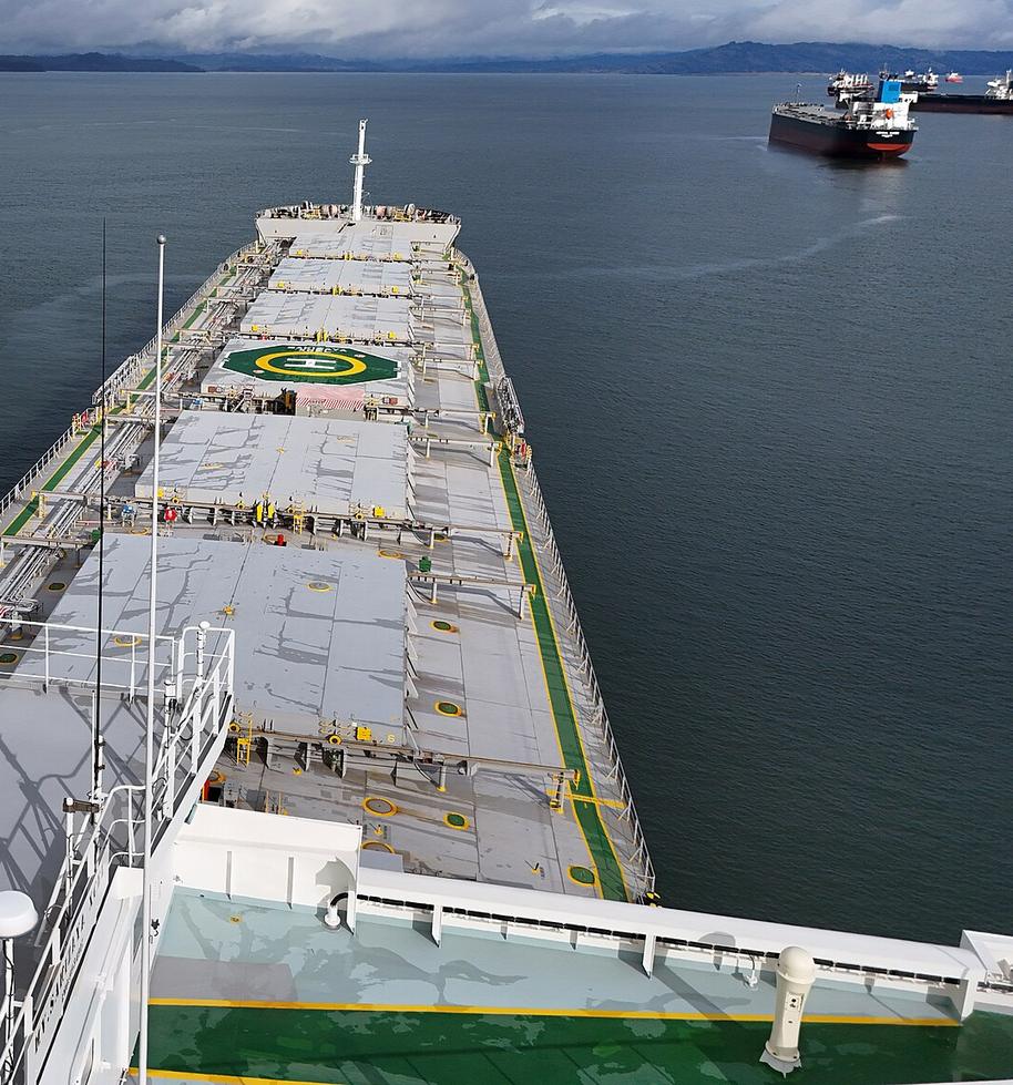 View over the cargo hatches from the bridge of a dry bulk carrier